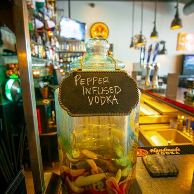 Pepper infused vodka bottle