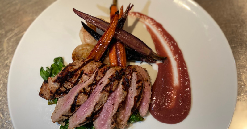 Grilled pork with roasted carrots