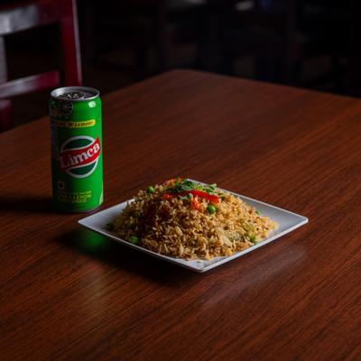 Chicken fried rice, and a can of soda.