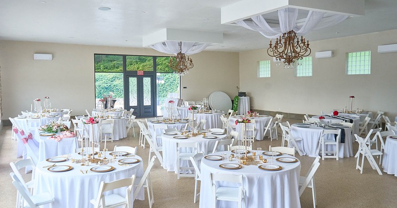 Interior, decorated tables ready for a wedding