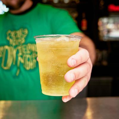 Bartender serving a cocktail.