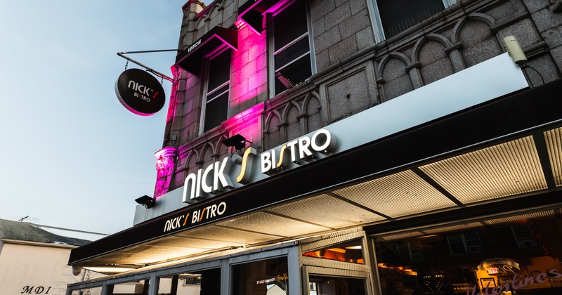 Exterior, front of restaurant, entrance, sign above