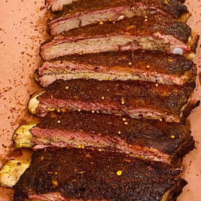 Cooked and sliced pork ribs, close-up.