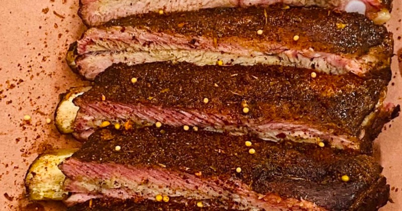 Smoked ribs sliced and seasoned, close-up