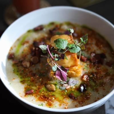 Rice porridge with pork and herbs.