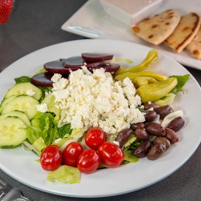 Greek salad served with pita.