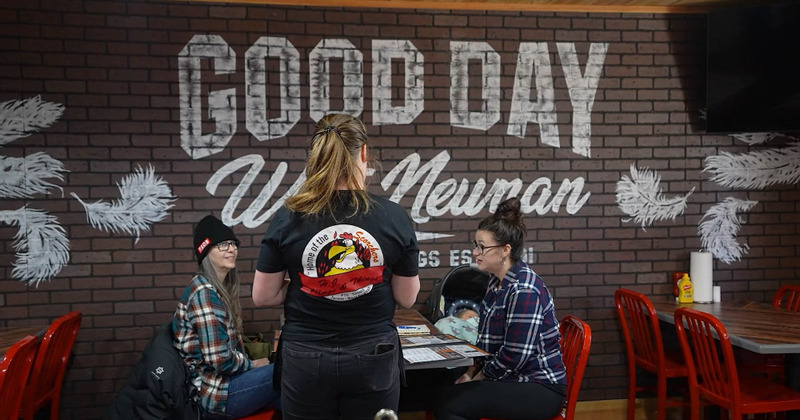 Guests sitting at the table and getting served