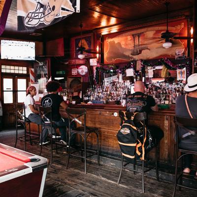 Customers sitting in bar area