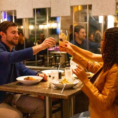 Customers having food and drinks.