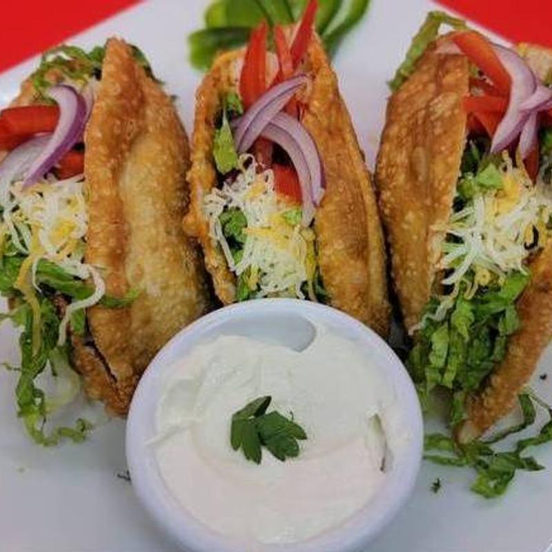 3 Vegan Pizzanada Gordita Empanada Taco photo