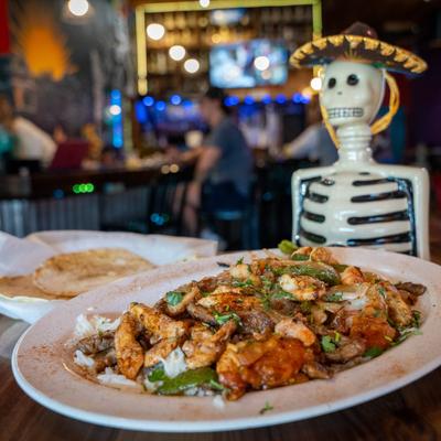 Chicken, steak, and shrimp Fajitas.