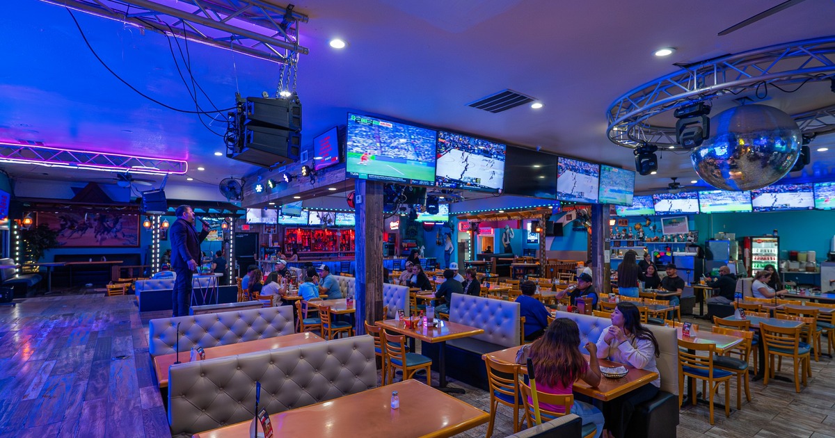 Interior, seating area with live stage and a disco ball