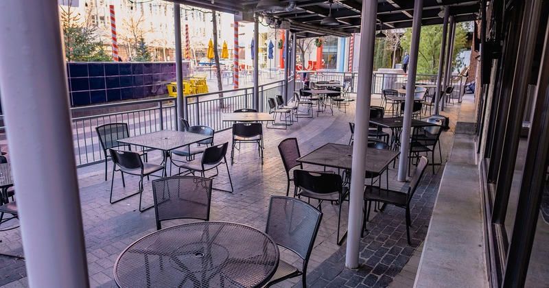 Patio with metal tables and chairs