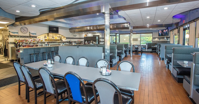 Spacious interior dining area with tables ready for guests