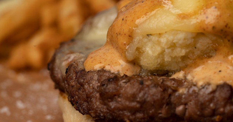 Burger with cheese on top, close up