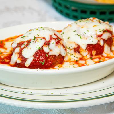 Meatballs, in cheese and marinara sauce.
