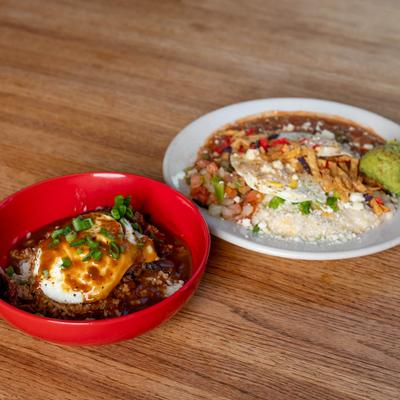Breakfast plates on a wooden table.