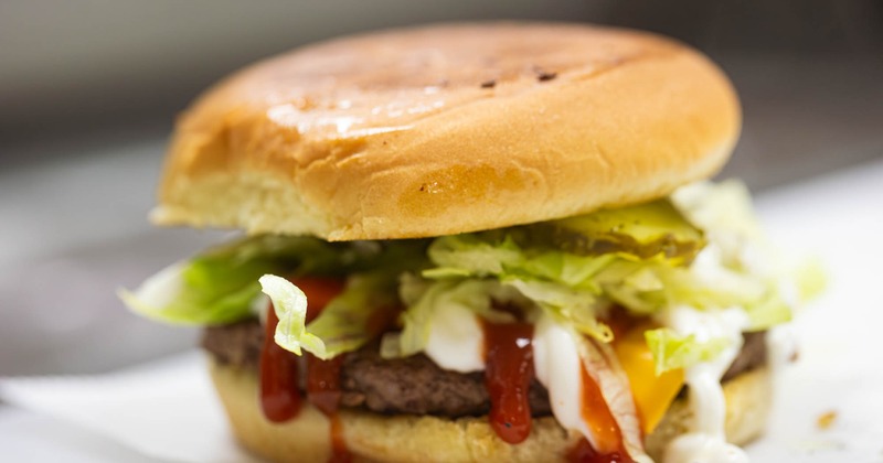 Close-up of a juicy burger with a soft bun