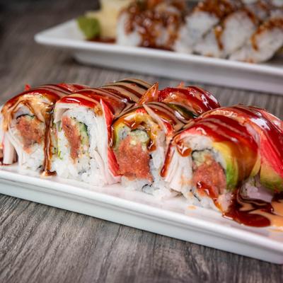 Dynamite roll with salmon, cucumber, spicy crabmeat and avocado.