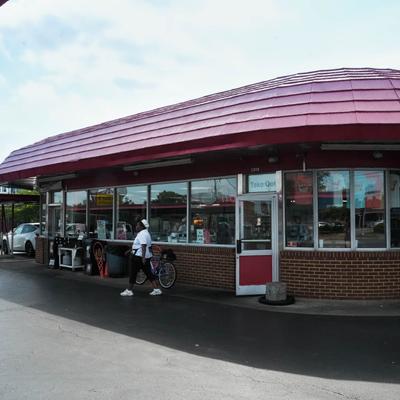 Exterior, front entrance and serving counter.
