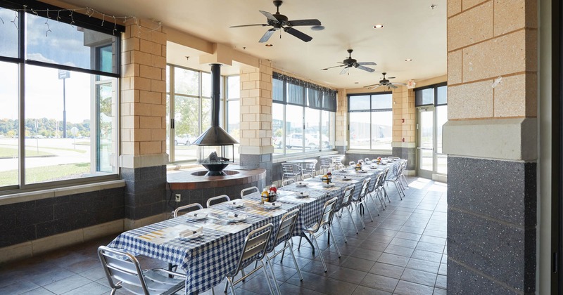 Interior, a long table ready for guests