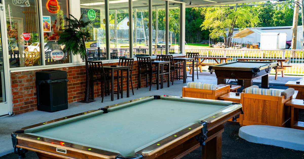 Exterior, patio, terrace, pool table, bar behind