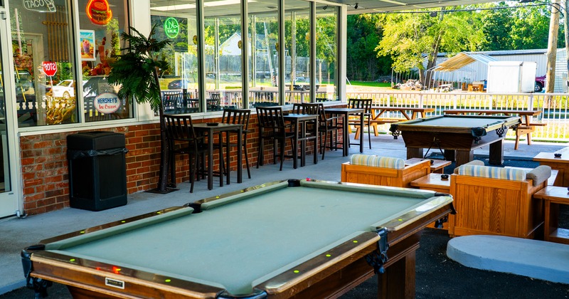 Exterior, patio, terrace, pool table, bar behind