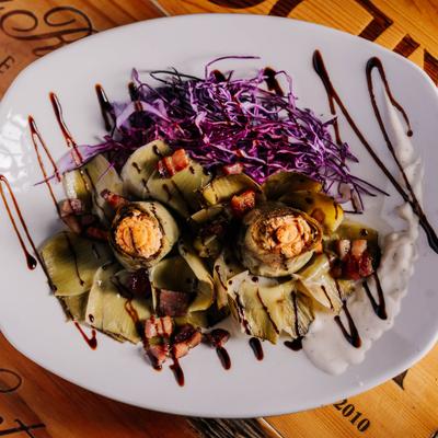 A dish of roasted artichokes.