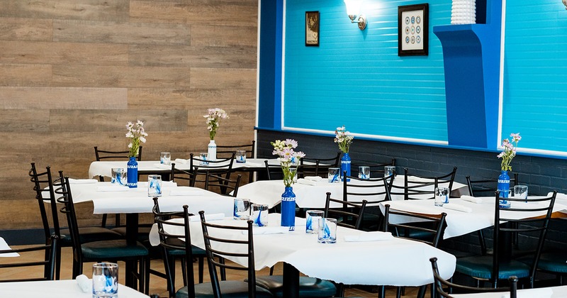 Restaurant interior, dining room with set tables