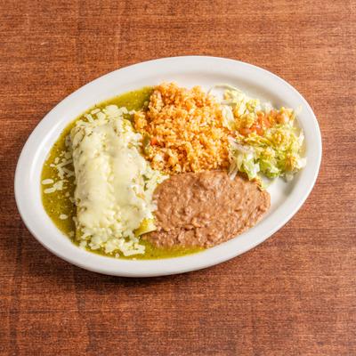 Enchiladas covered in green salsa and melted cheese served served with rice, beans, and salad.