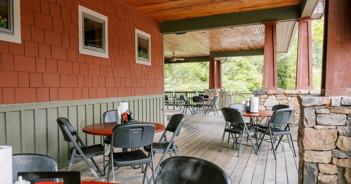 Exterior seating area with chairs and tables