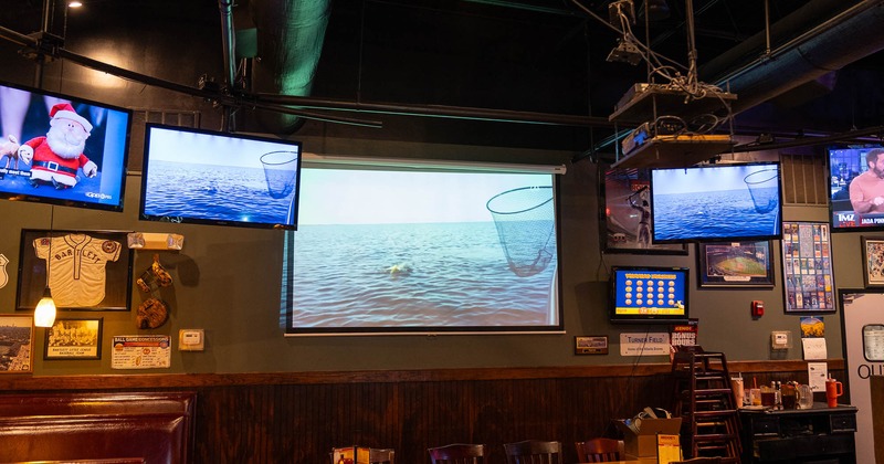 Interior seating area, TVs on the walls