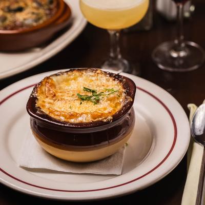 French onion soup on dining table.