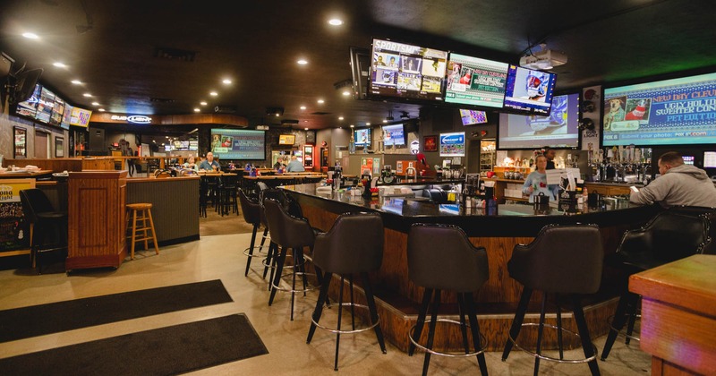 Interior, wide view, bar with chairs lined up