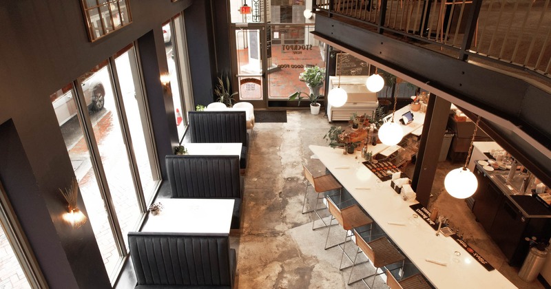 Interior, look from above on leather booths and bar