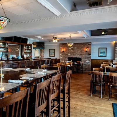Interior, seating area, tables and chairs.