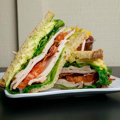 Turkey, avocado, and BLT sandwich.