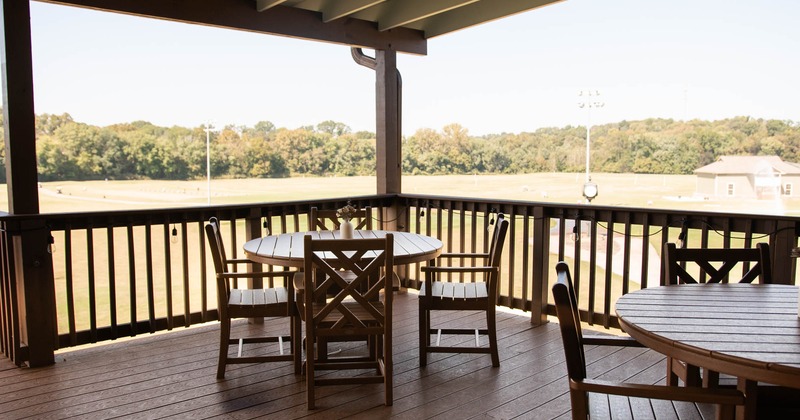 Exterior, covered patio area with guest tables and seats