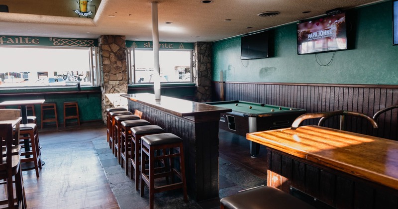 Counter seating and a pool table