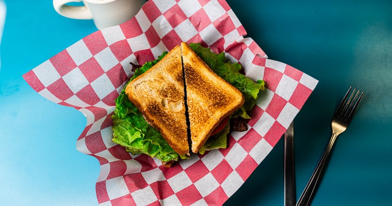 BLT sandwich and hot chocolate, top view