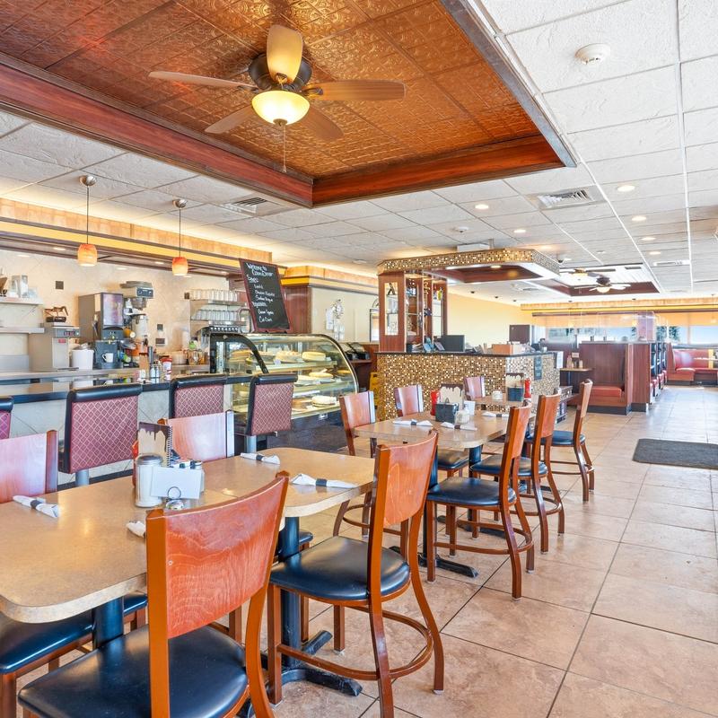 Interior, tables ready for guests