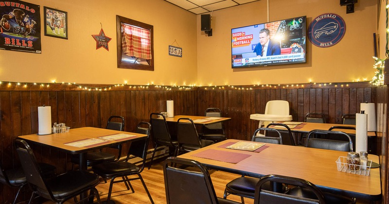 Interior, seating place near the wall with decoration and TV