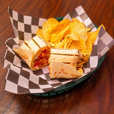 Crispy chicken wrap with potato chips.