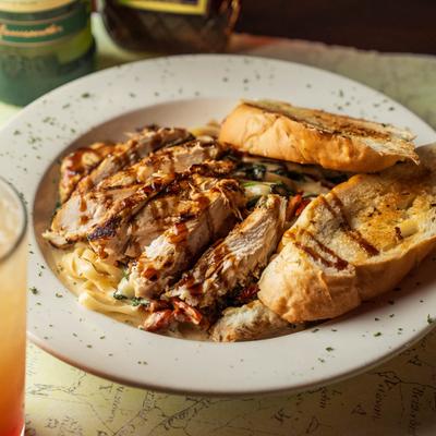 Chicken Fettucine served with bread.