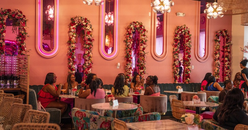 Lively and cozy interior dining area full of guests