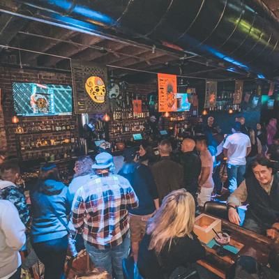 Interior, bar area full of people