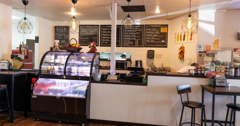 Ordering counter and display case with food and drinks