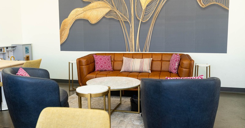 Interior, seating area, sofa, armchairs and a coffee table