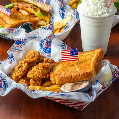 Chicken tenders, Texas toast, dipping sauce, potato salad, and fries.