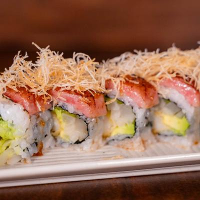 Wagyu beef sushi rolls with crunchy topping.